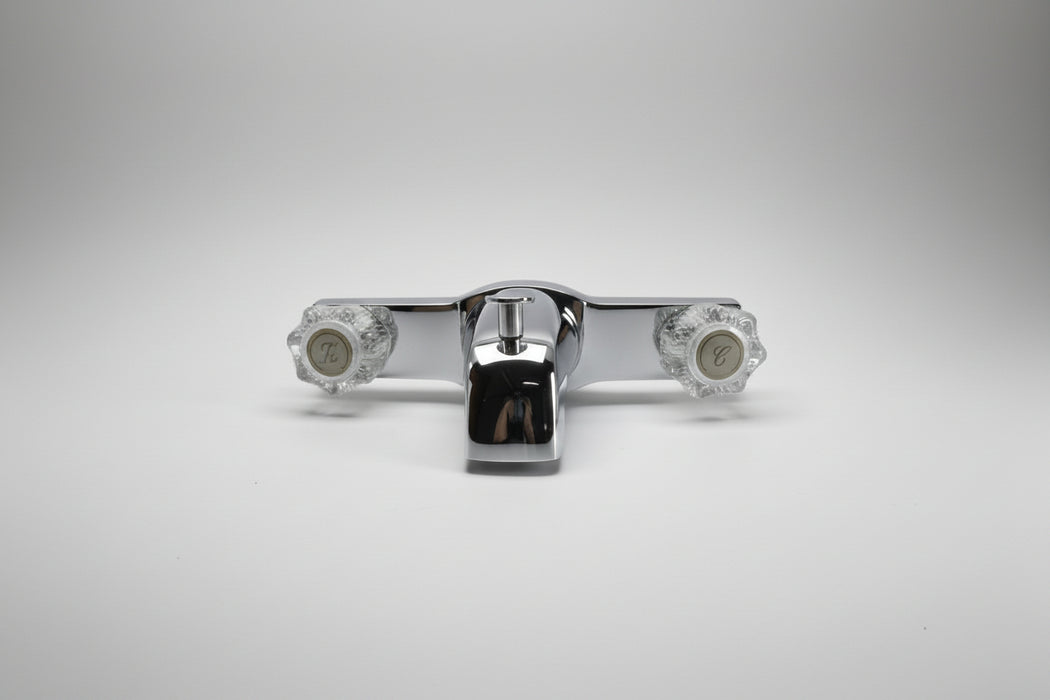 Chrome valve handle on a white background