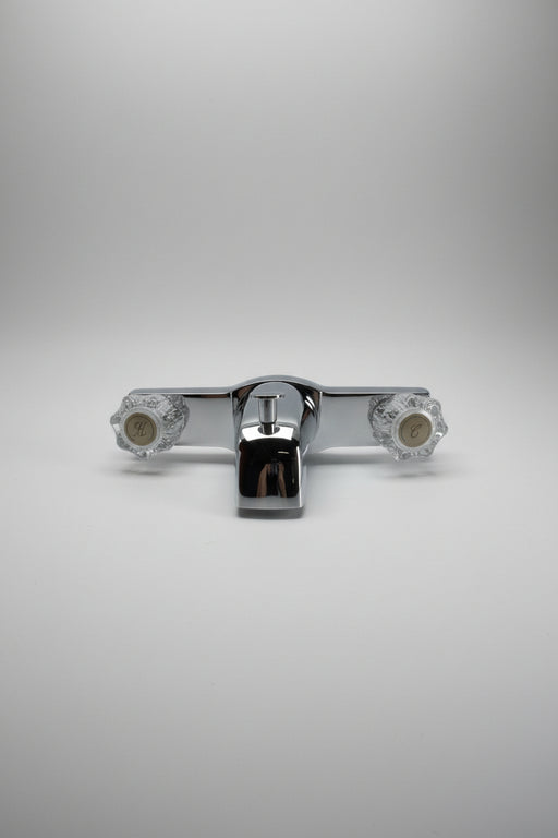 Chrome valve handle on a white background