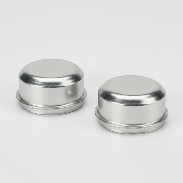 Two round steel dust caps with a silver finish, designed for trailer hubs.